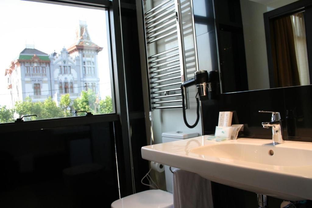 Hotel Villa Rosario Ii, Edificio Moderno Рибадесела Екстериор снимка